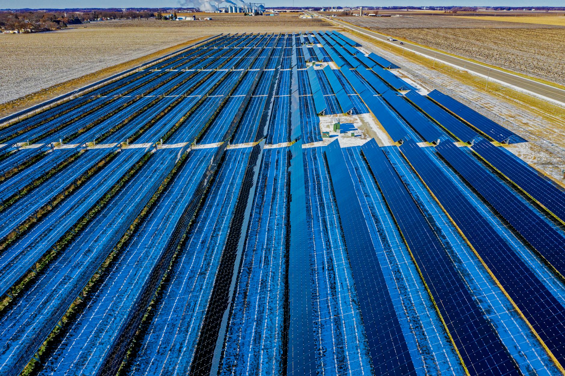 aerial photography of blue solar panels