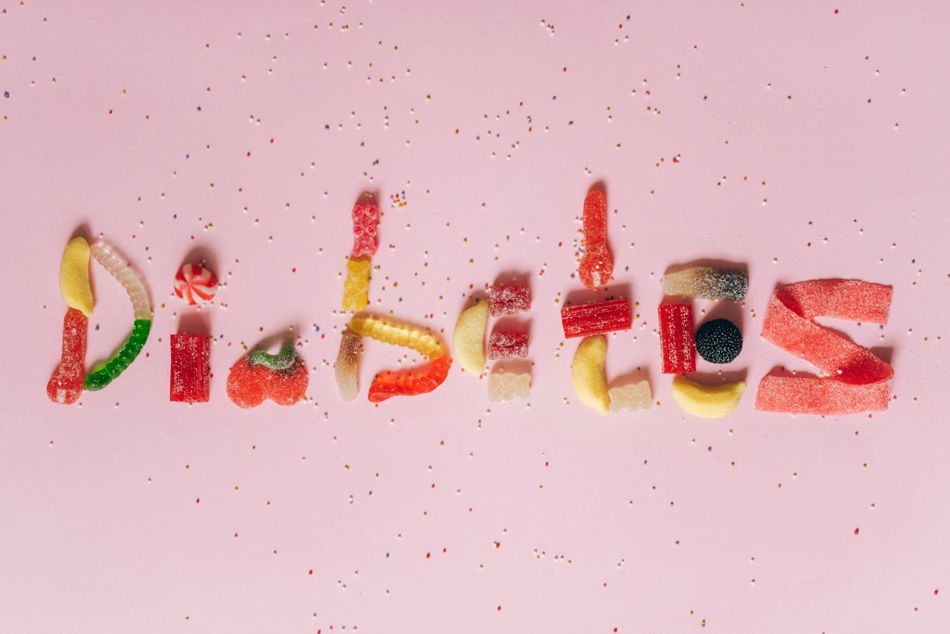 candies on pink surface